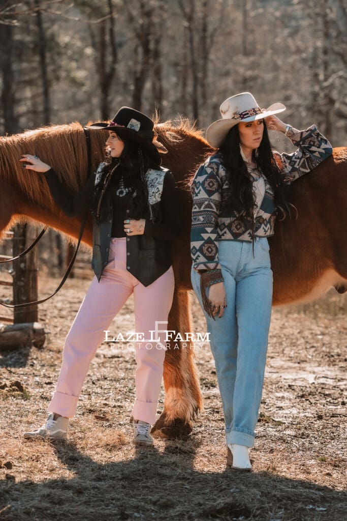 cowgirls looking away from each other