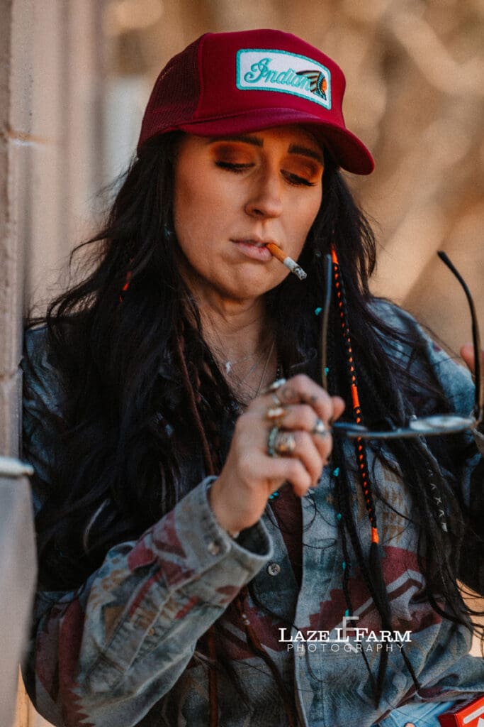 cowgirl smoking a cigarette