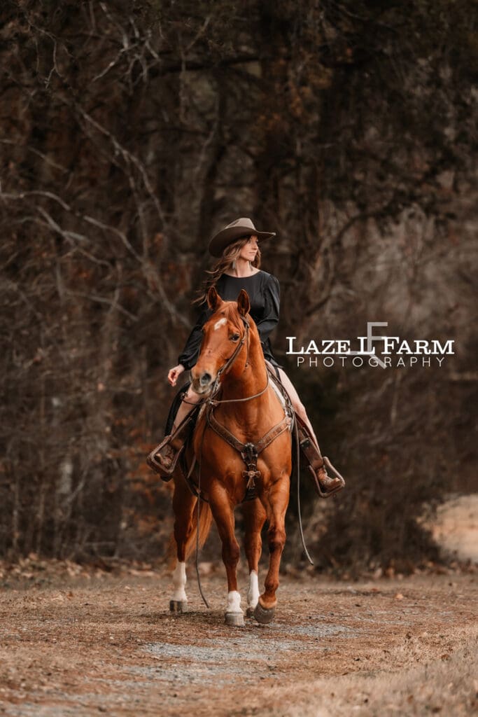 cowgirl riding her horse
