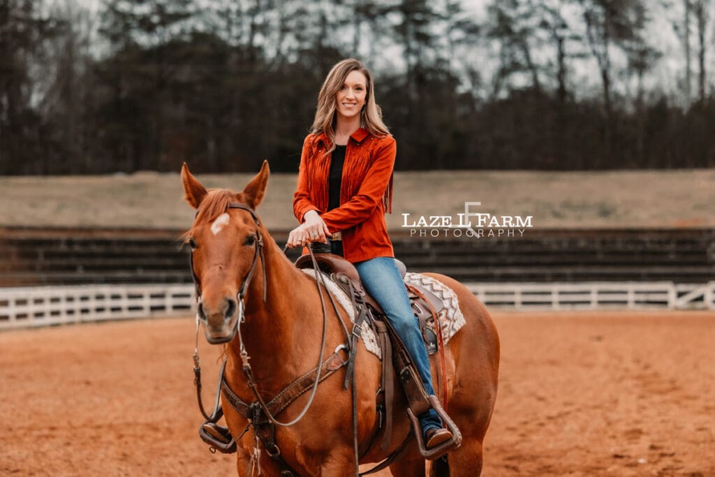cowgirl riding her horse