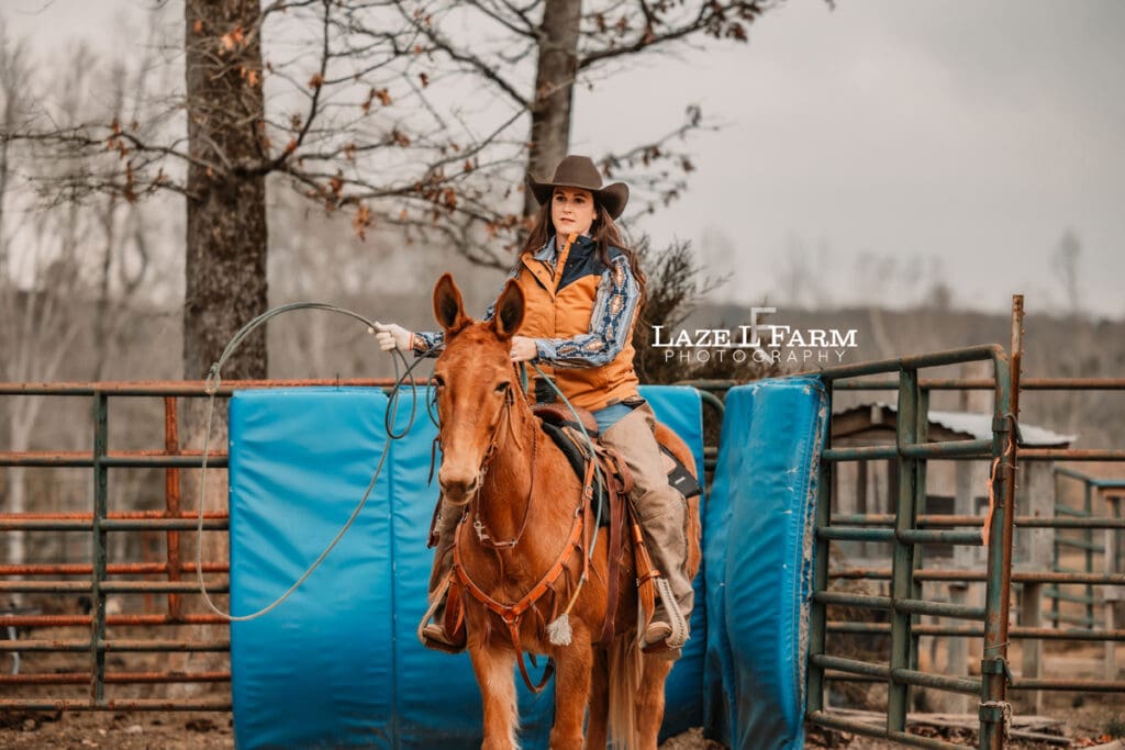 cowgirl roping on mule