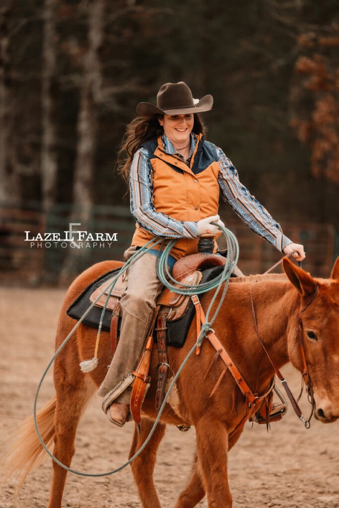 cowgirl riding her mule