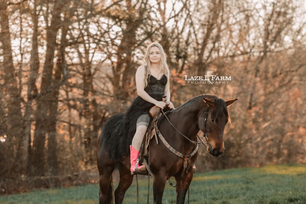 girl in a dress riding a horse