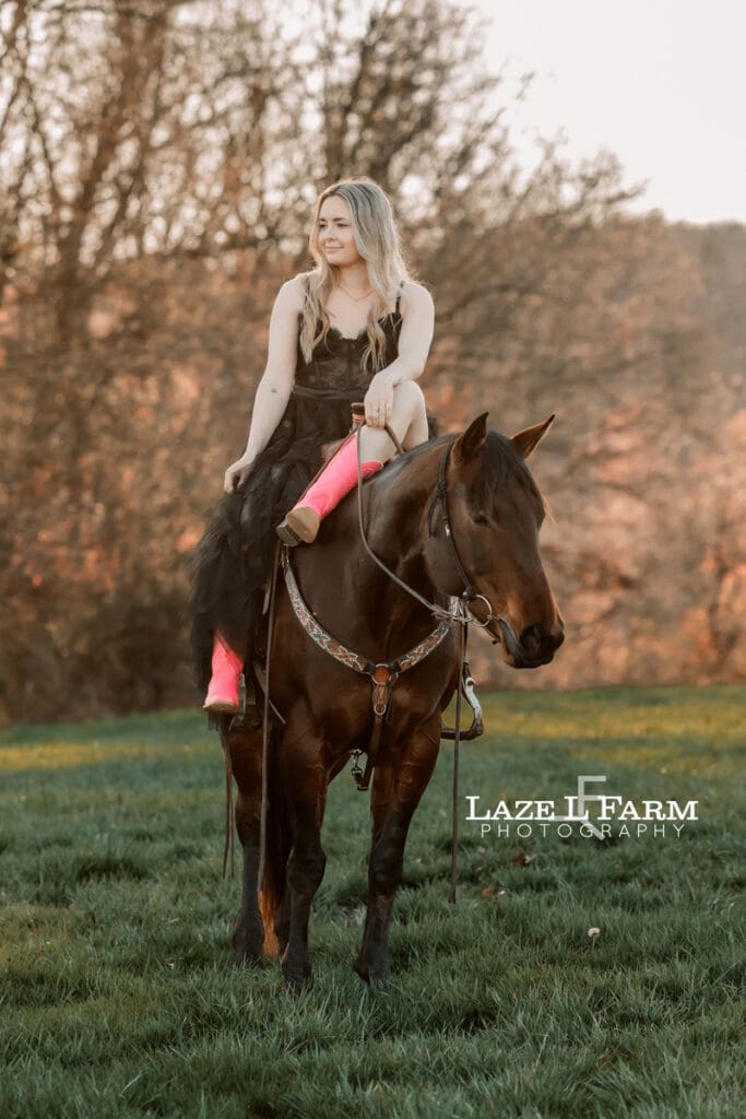 girl in a dress riding a horse