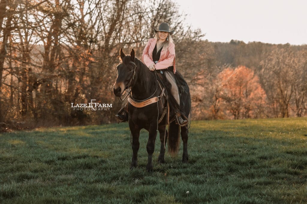 girl in a dress riding a horse