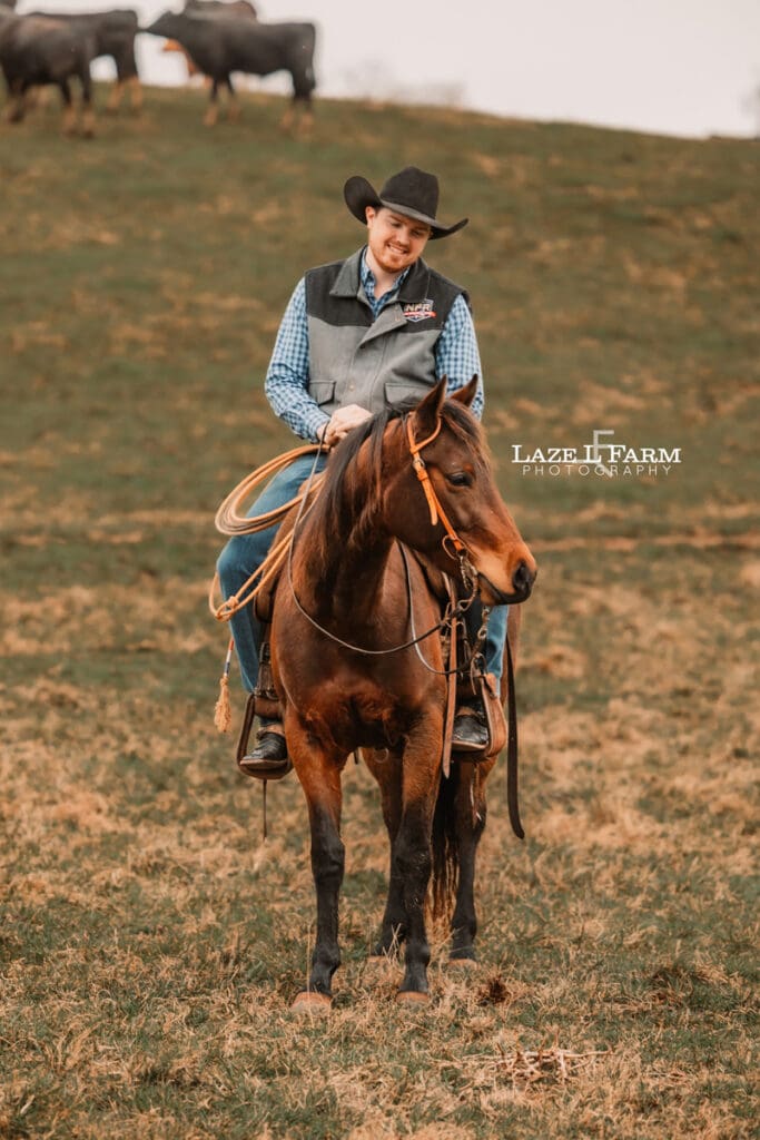 cowboy sitting on his horse