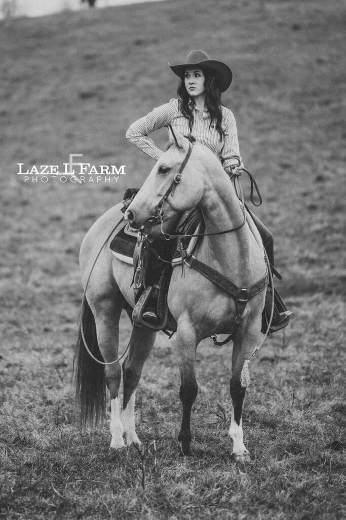 cowgirl sitting on her horse