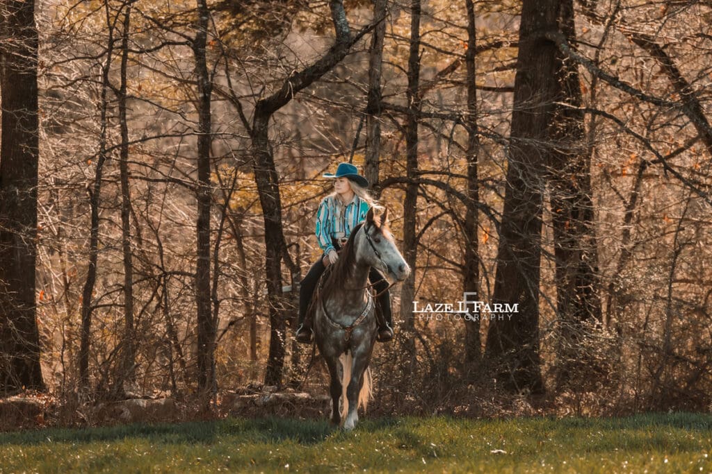 cowgirl riding her horse