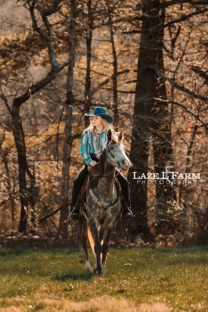 cowgirl riding her horse