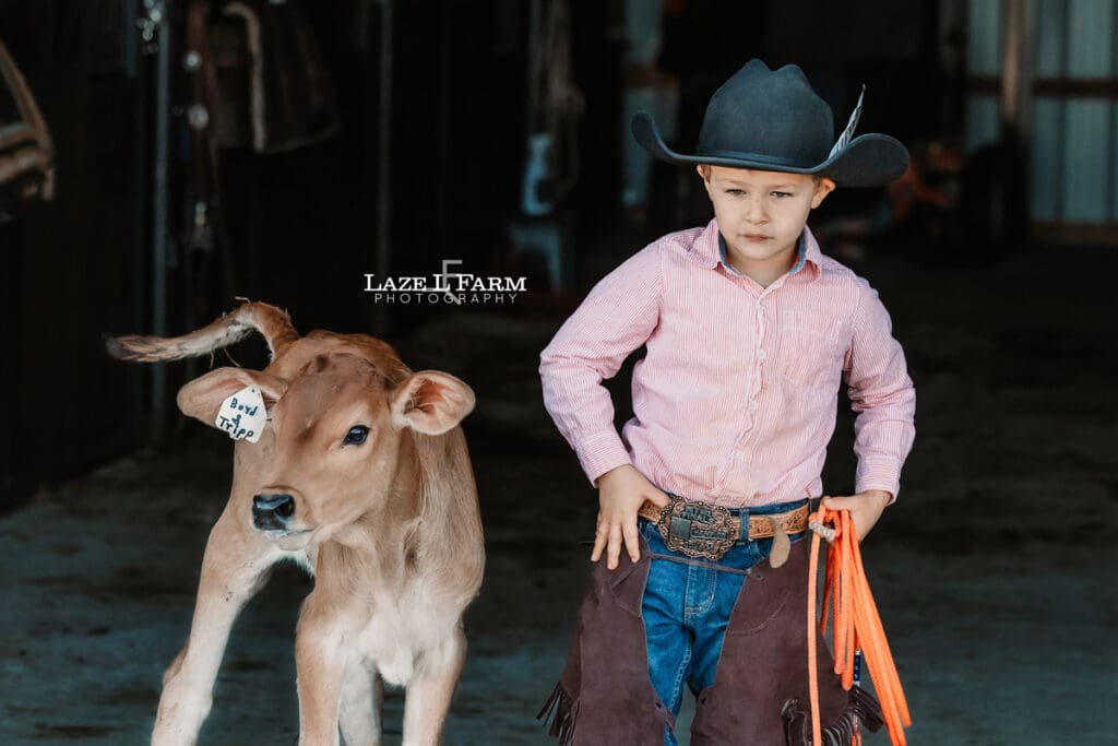 cowboy with his calf