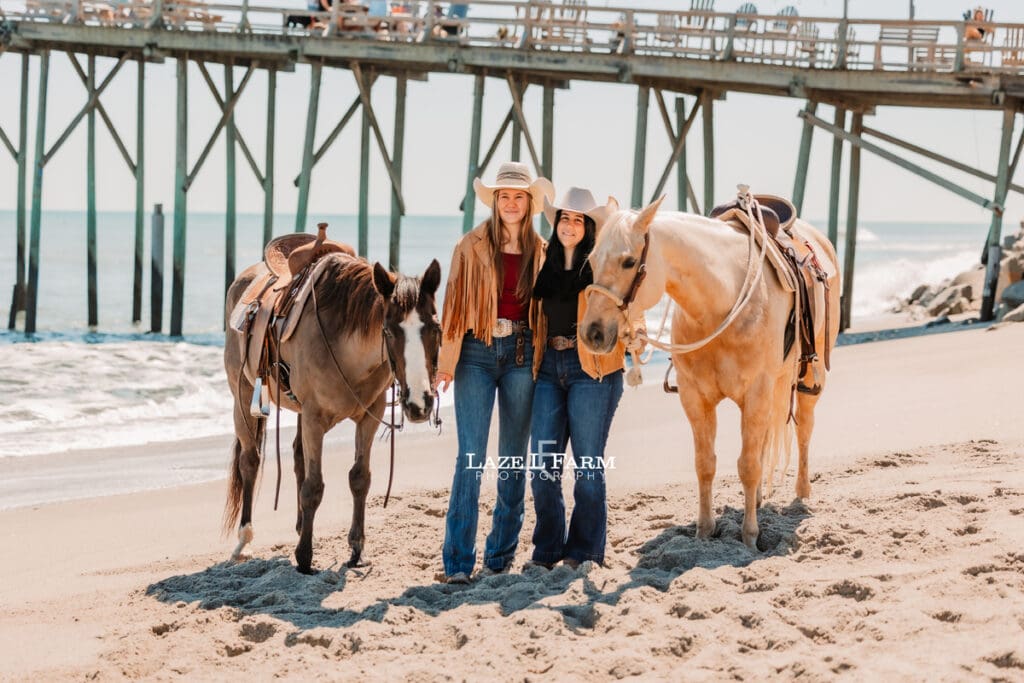 best friends with their horses on the beach