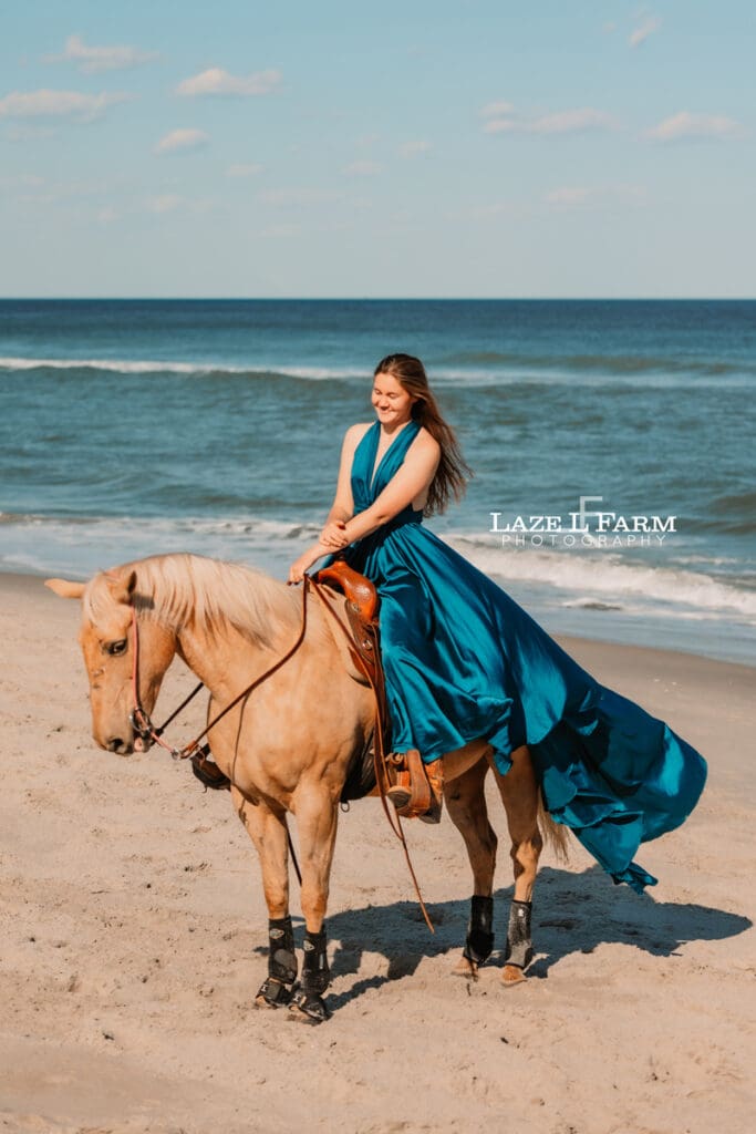 cowgirl on the beach in a flying dress