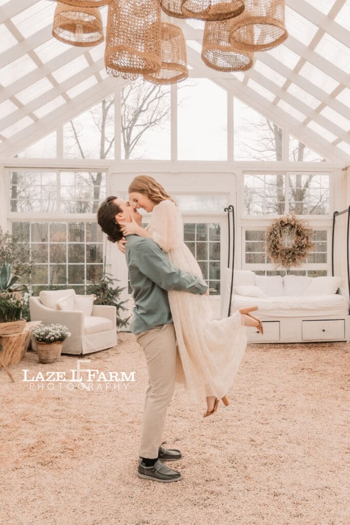 couple lifting each other up