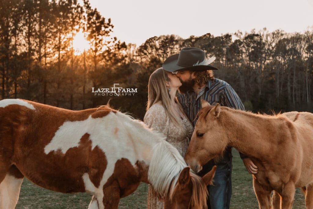 baby horses and western couple