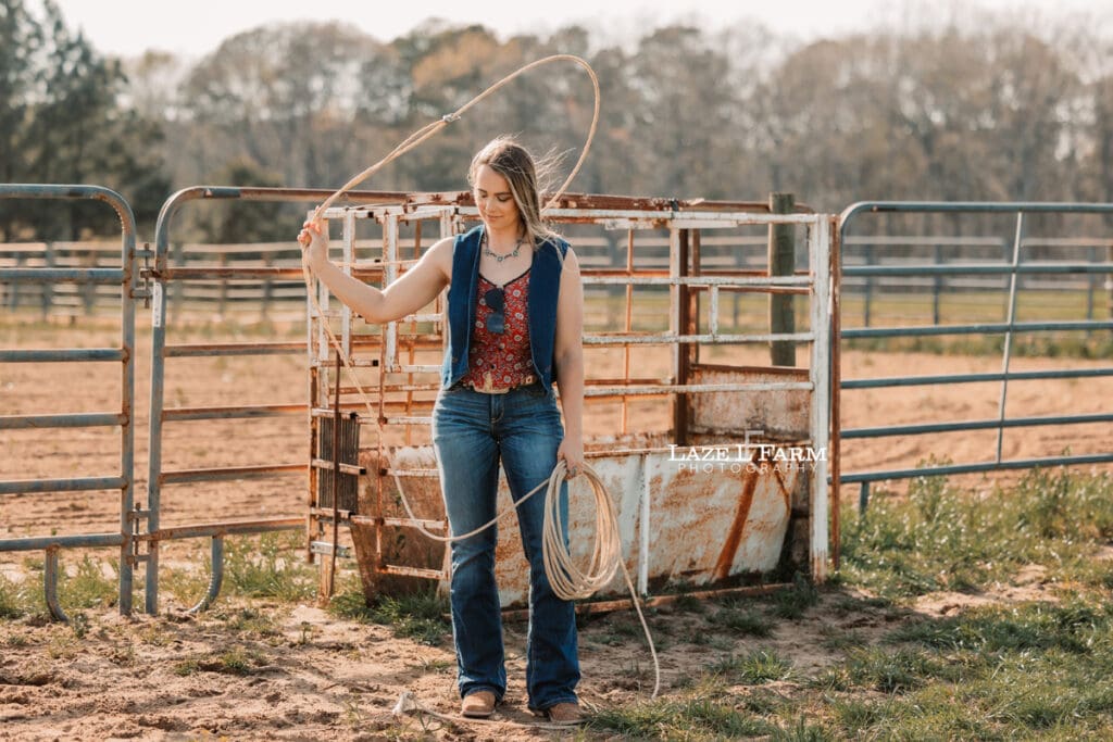cowgirl swinging a rope