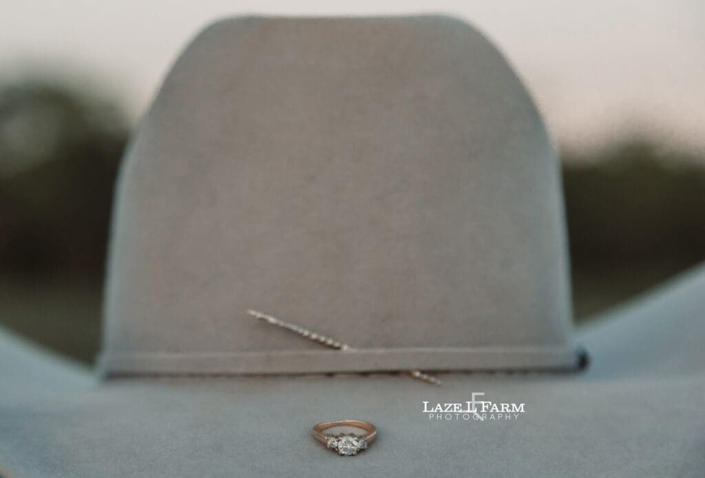 engagement ring on cowboy hat