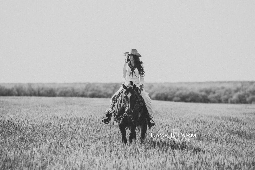 cowgirl bride sitting on her horse