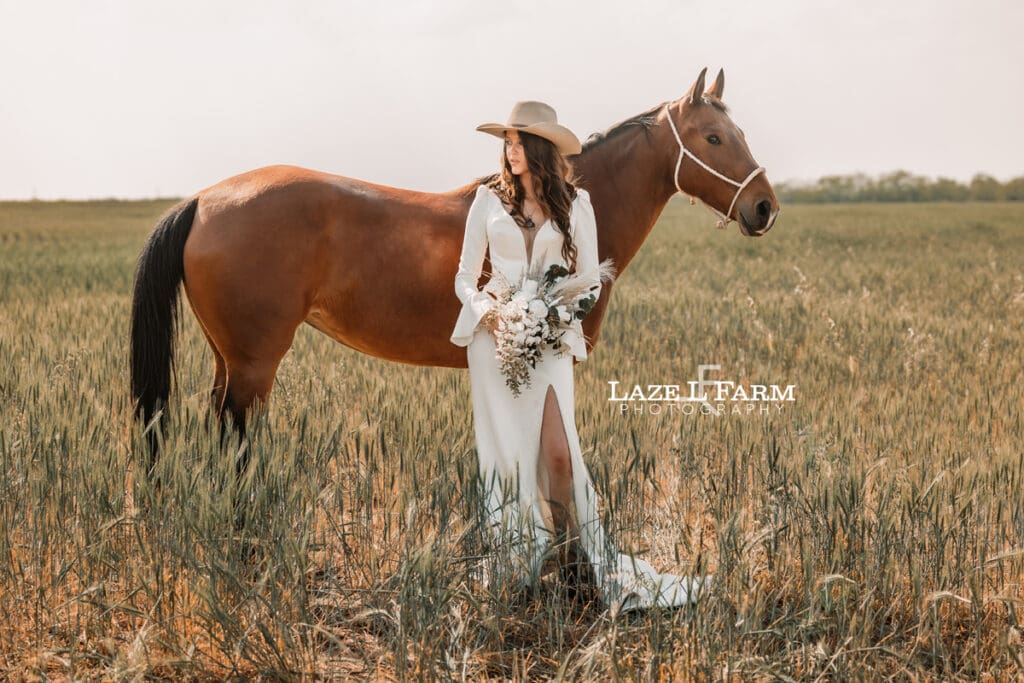 cowgirl bride with her horsea and flowers