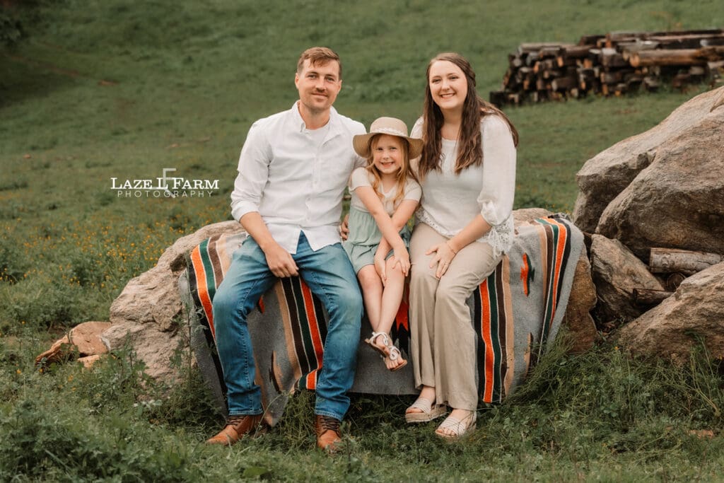 family pictures sitting on the rocks