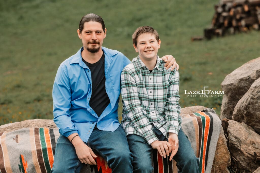 family pictures sitting on the rocks