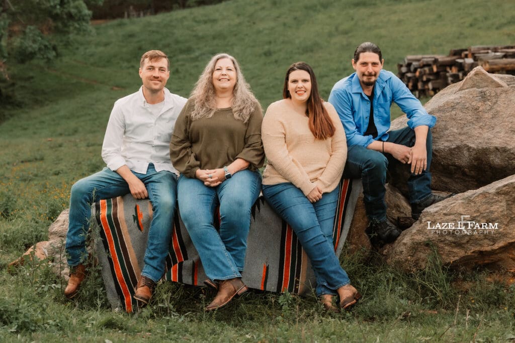 family pictures sitting on the rocks