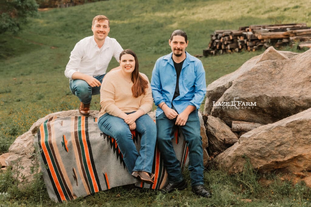 family pictures sitting on the rocks
