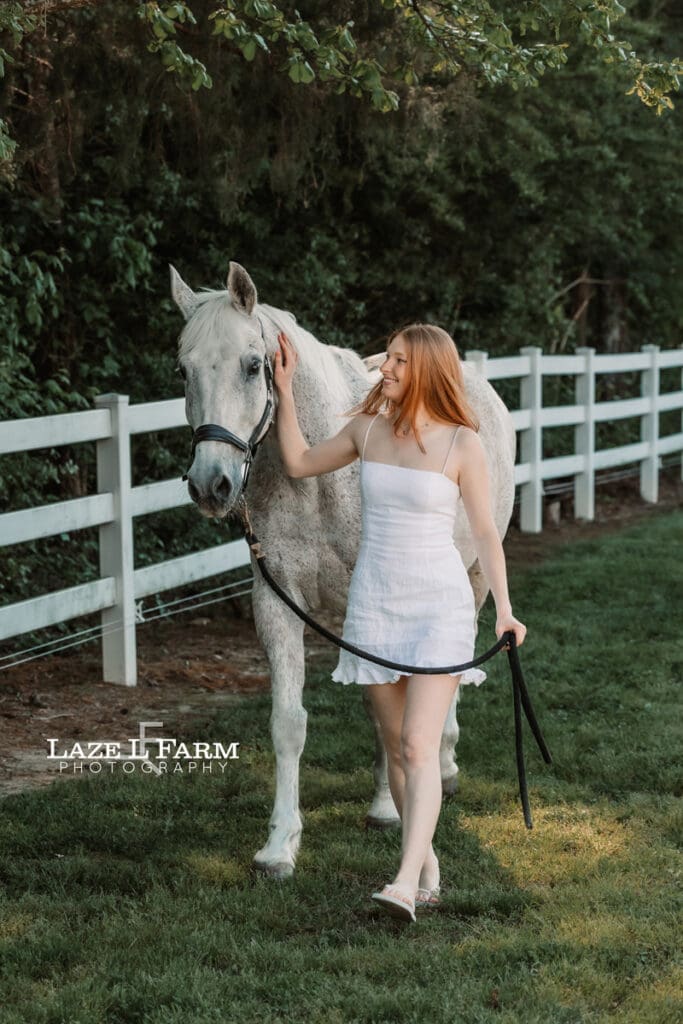 girl walking with her horse
