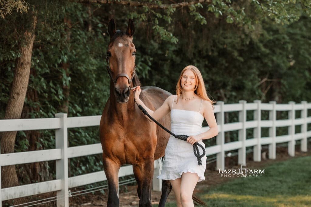 girl walking with her horse