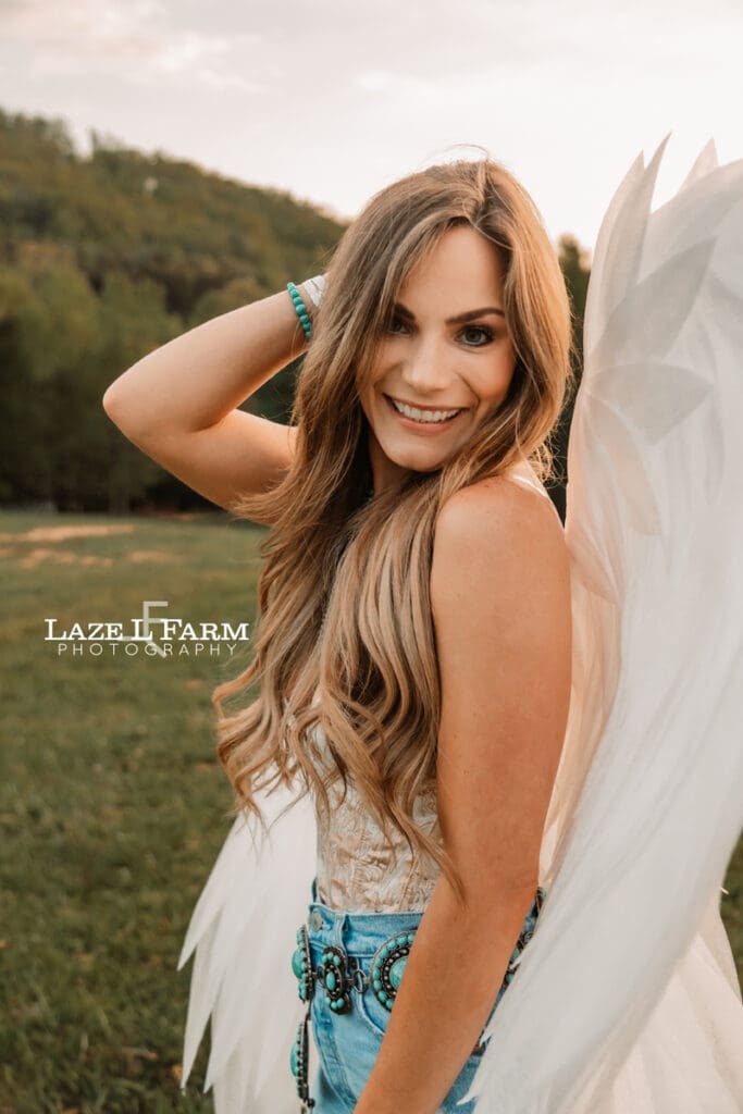 cowgirl wearing angel wings