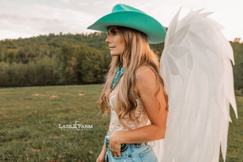 cowgirl wearing angel wings