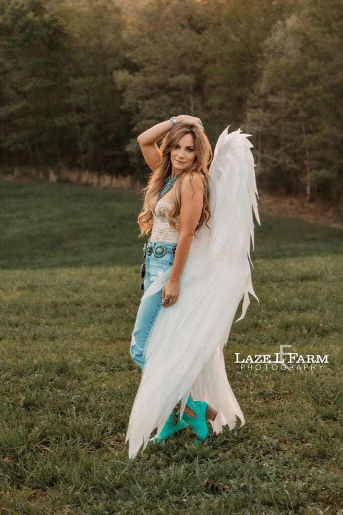 cowgirl wearing angel wings
