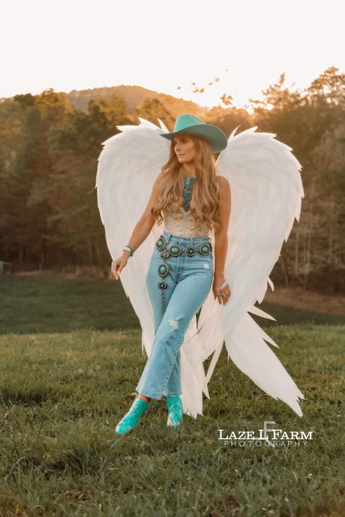 cowgirl wearing angel wings