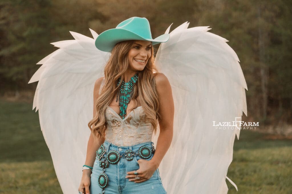 cowgirl wearing angel wings