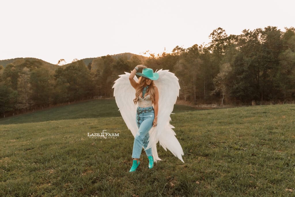 cowgirl wearing angel wings