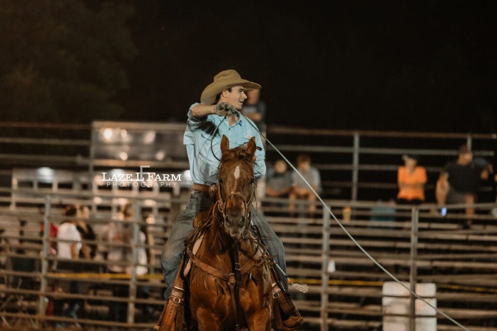 Team Roping at the Cleveland Rodeo while Laze L Farm Photography takes pictures