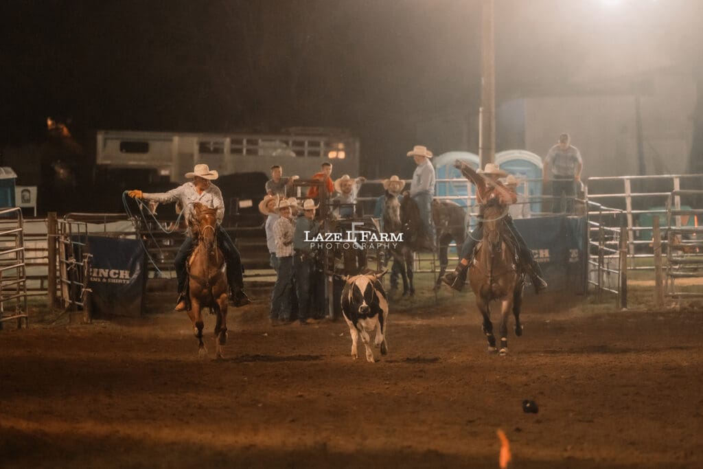 Team Roping at the Cleveland Rodeo while Laze L Farm Photography takes pictures