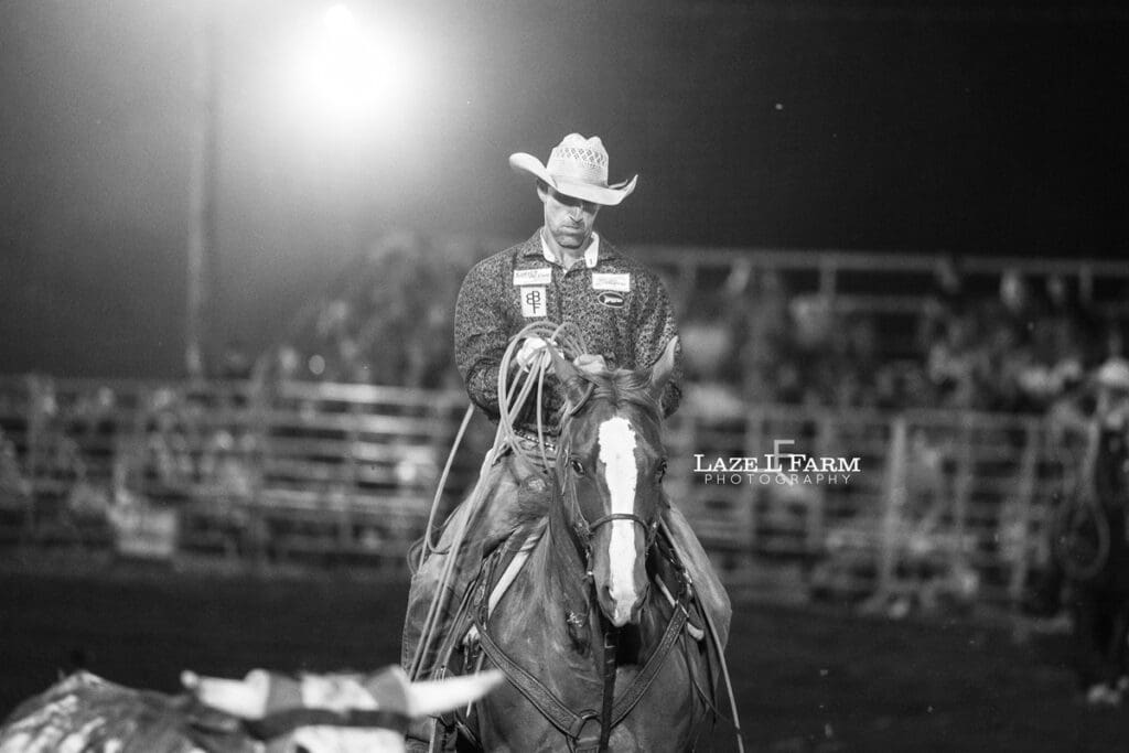 Team Roping at the Cleveland Rodeo while Laze L Farm Photography takes pictures