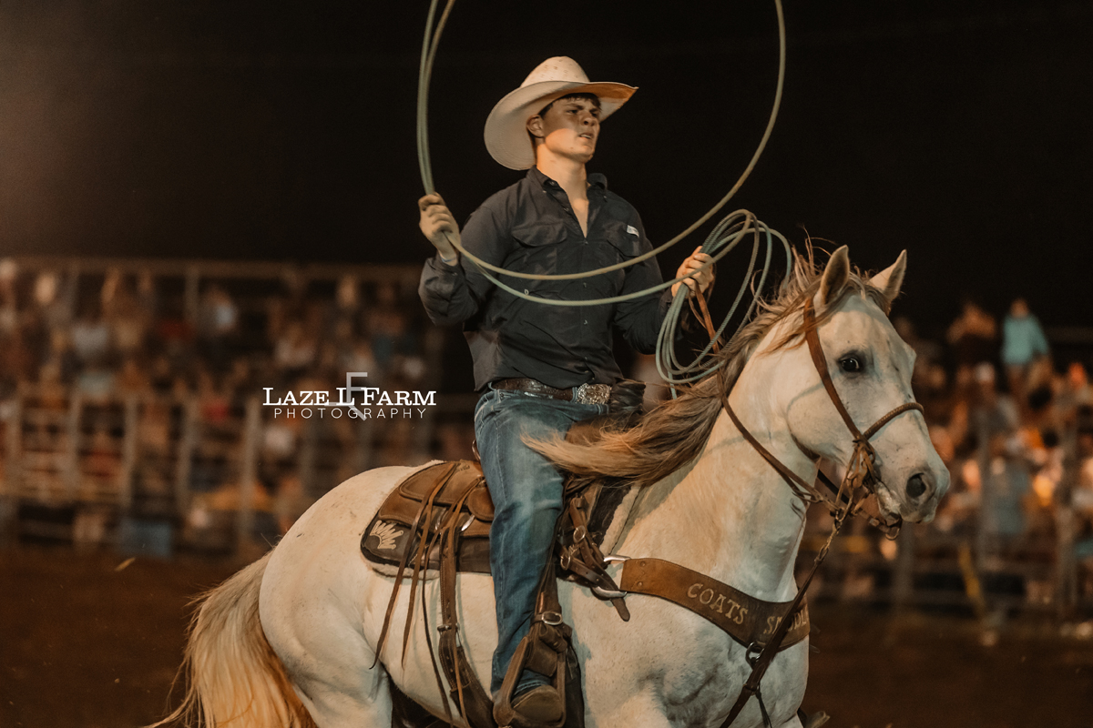 Team Roping at the Cleveland Rodeo while Laze L Farm Photography takes pictures