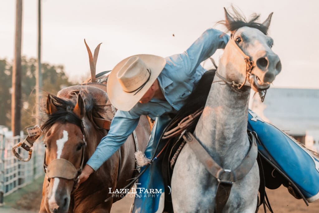 Pickup men at the rodeo at the Cleveland Rodeo while Laze L Farm Photography takes pictures