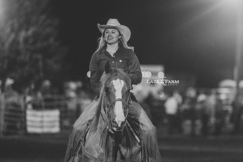 cowgirl riding her horse at the Cleveland Rodeo with pictures by Laze L Farm Photography