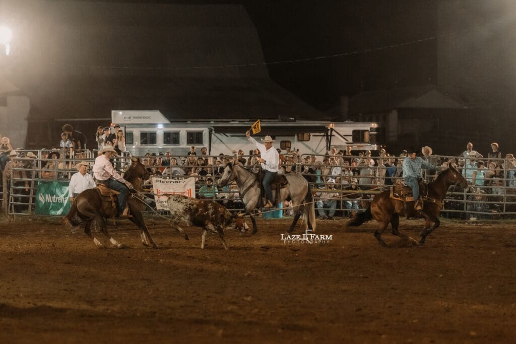 Team Roping at at the Cleveland Rodeo with pictures by Laze L Farm Photography