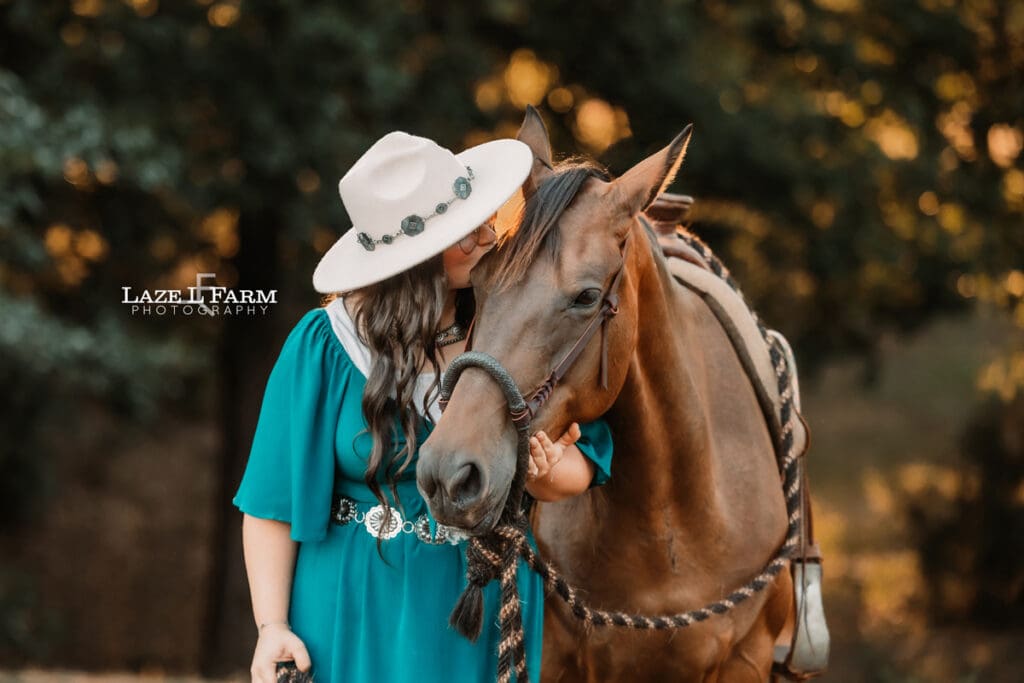 A cowgirl and her horse during an equine photoshoot with Laze L Farm Photography