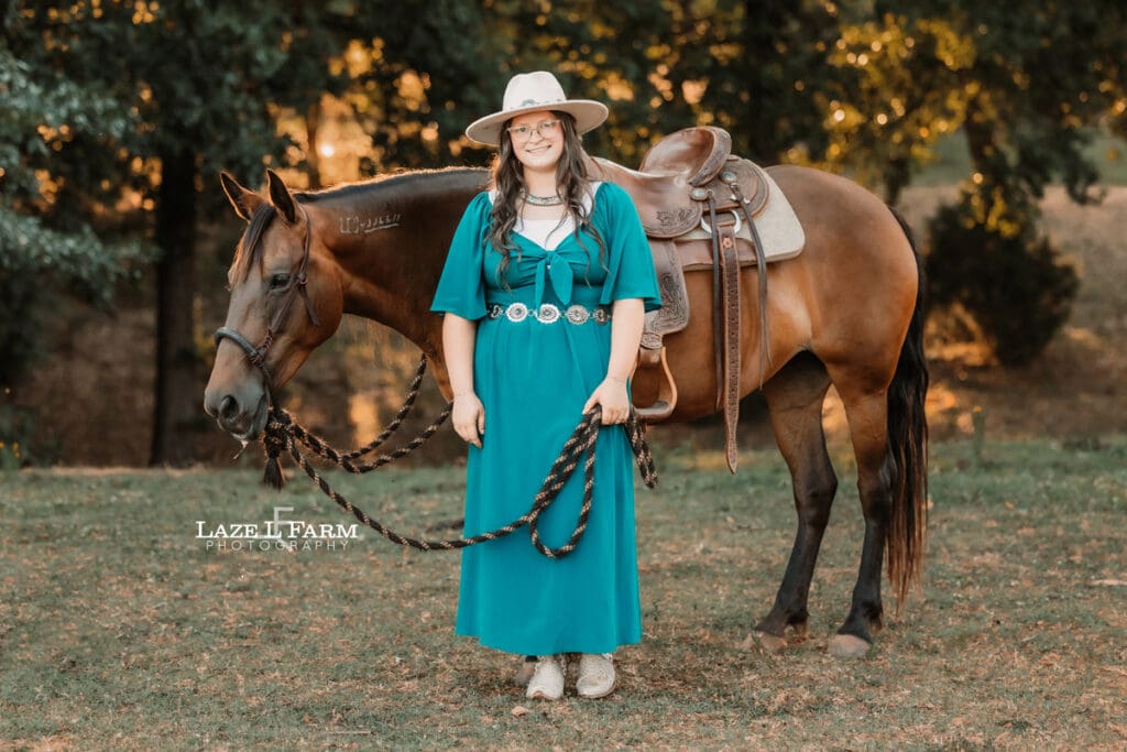 A cowgirl and her horse during an equine photoshoot with Laze L Farm Photography