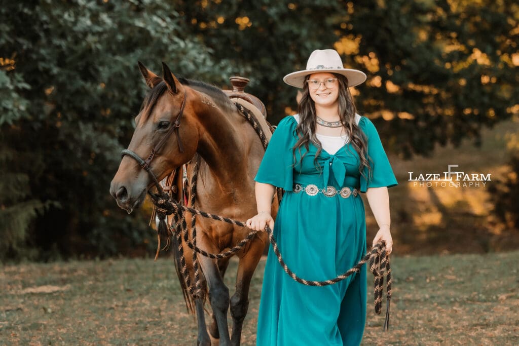 A cowgirl and her horse during an equine photoshoot with Laze L Farm Photography