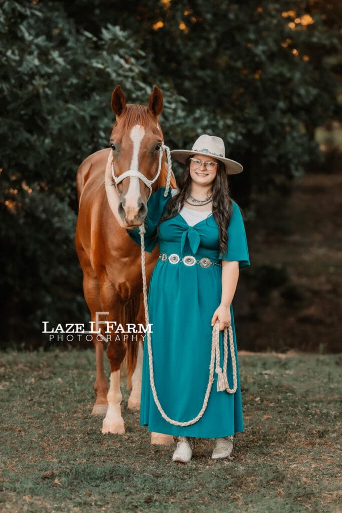 A cowgirl and her horse during an equine photoshoot with Laze L Farm Photography
