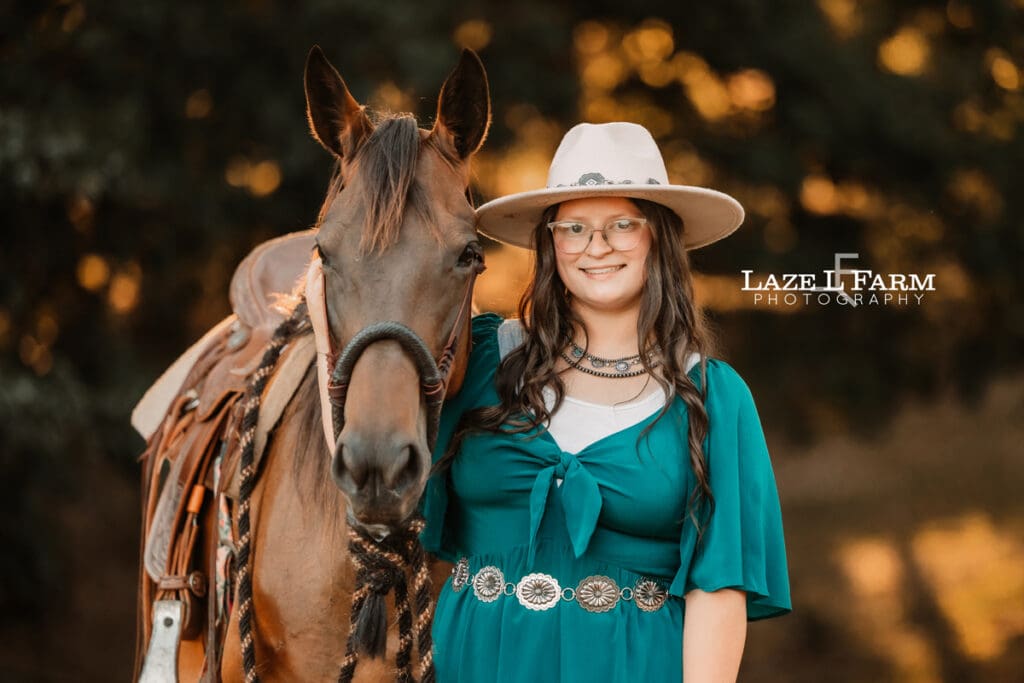 A cowgirl and her horse during an equine photoshoot with Laze L Farm Photography