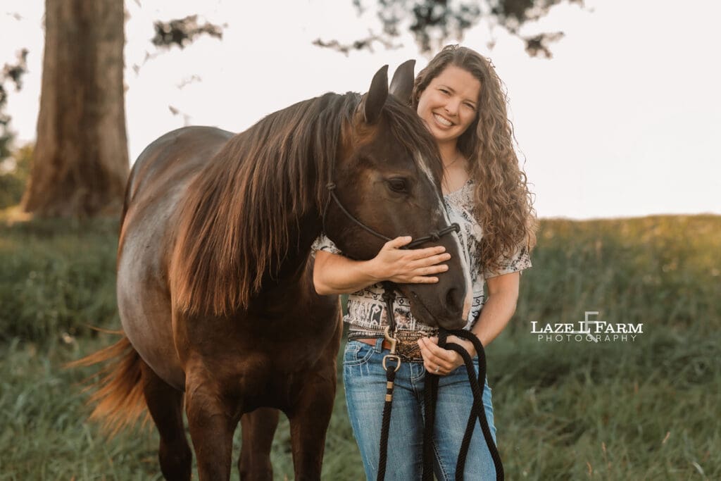 a cowgirl with her horse during a photoshoot with Laze L Farm Photography