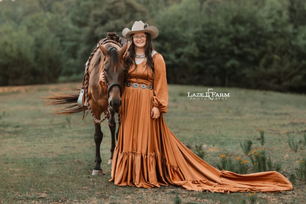 A cowgirl and her horse during an equine photoshoot with Laze L Farm Photography