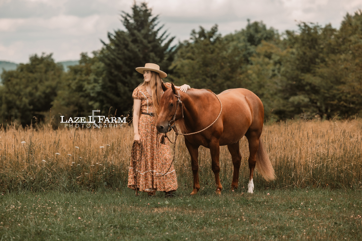 Elizabeth standing with her horse in the mountains at Elk Garden, Virginia